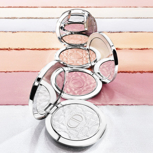 A collection of Dior Forever Glow Luminizers in three finishes: Halo, Strobe, and Sequin, displayed on a gradient background.
